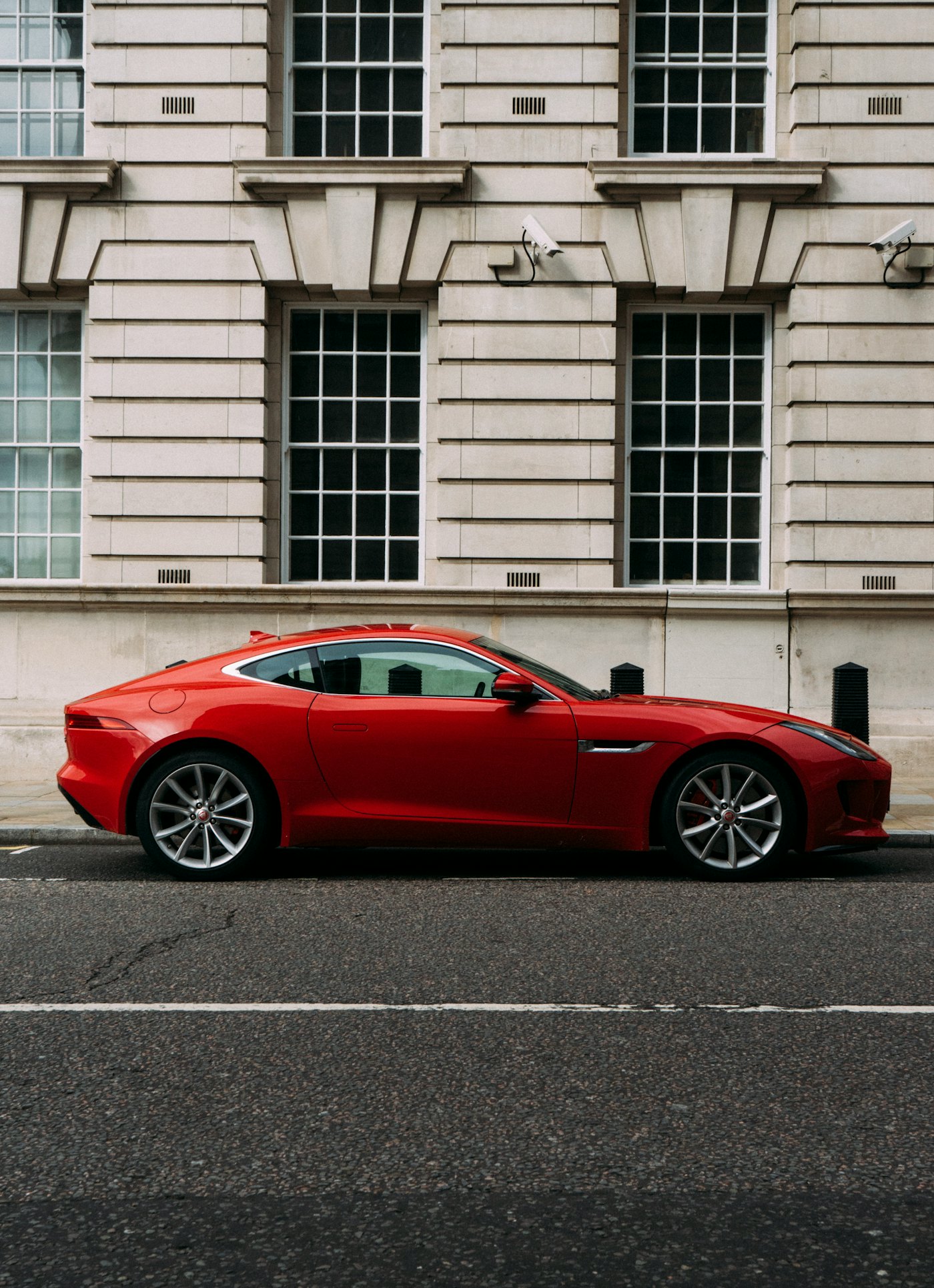 A red sports coupe